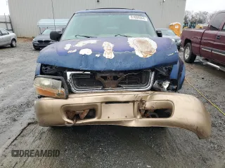 1999 GMC Jimmy SLE with VIN 1GKDT13W8X2545509, listed as a Copart auction lot 81608944 with 130,881 mi miles and Salvage Title. Bid and sale history available at carsss.com. Image 5.