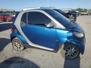 2009 Smart fortwo Pure z VIN WMEEJ31X39K273968, wystawiony jako Copart lot #56888045 z przebiegiem 125 138 mil mil oraz Szkody całkowita. Historia ofert i sprzedaży dostępna na DreamBid. Obrazek 4.