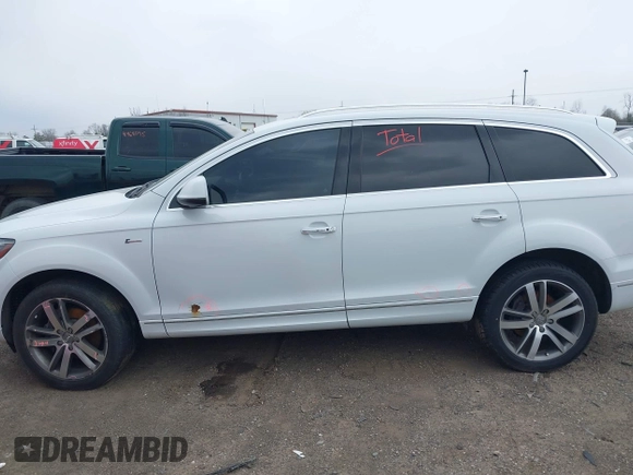 2015 Audi Q7 Premium Plus with VIN WA1LGAFE7FD030822, listed as a IAAI auction lot 41957888 with 116,476 mi miles and . Bid and sale history available at DreamBid. Image 14.