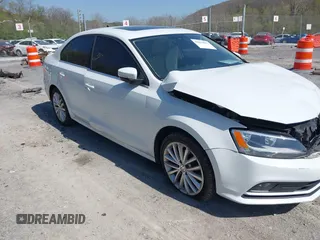 2016 Volkswagen Jetta SEL z VIN 3VWL07AJ9GM227950, wystawiony jako IAAI lot #42070917 z przebiegiem 92 618 mil mil oraz . Historia ofert i sprzedaży dostępna na DreamBid. Obrazek 1.