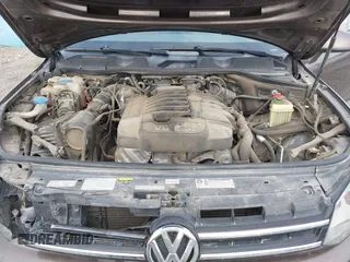 2013 Volkswagen Touareg Lux with VIN WVGEF9BP1DD012851, listed as a IAAI auction lot 41732391 with 123,283 mi miles and . Bid and sale history available at DreamBid. Image 10.