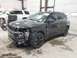 2020 Jeep Compass Latitude w/Sun/Safety Pkg with VIN 3C4NJCBB9LT257460, listed as a IAAI auction lot 41276767 with 76,744 mi miles. Bid and sale history available at carsss.com. Image 17.