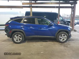 2022 Hyundai Tucson SEL with VIN 5NMJBCAEXNH069845, listed as a IAAI auction lot 41481383 with 10,985 mi miles and . Bid and sale history available at DreamBid. Image 14.