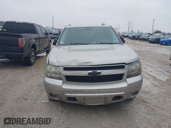2009 Chevrolet Suburban LT with VIN 1GNFK16309R259972, listed as a IAAI auction lot 41568798 with 327,218 mi miles. Bid and sale history available at carsss.com. Image 12.