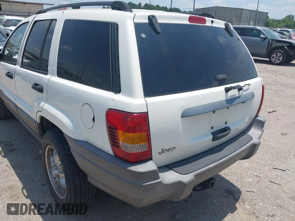 2003 Jeep Grand Cherokee Laredo with VIN 1J4GX48S63C546208, listed as a IAAI auction lot 42288811 with 141,696 mi miles and . Bid and sale history available at DreamBid. Image 3.