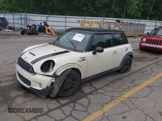 2007 MINI Hardtop S with VIN WMWMF73587TL87127, listed as a IAAI auction lot 42648540 with Not provided miles and . Bid and sale history available at DreamBid. Image 2.