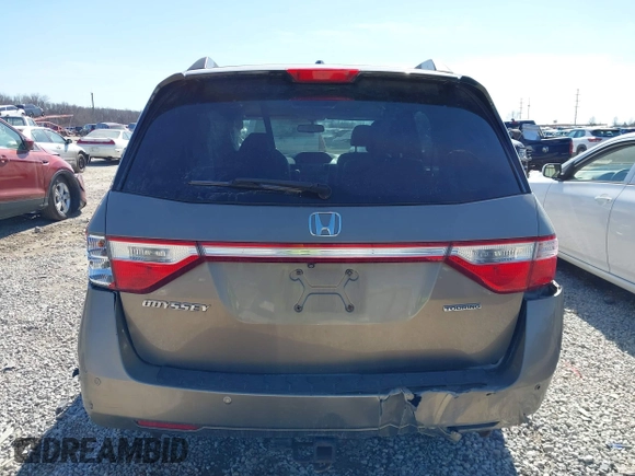 2012 Honda Odyssey Touring with VIN 5FNRL5H9XCB110672, listed as a IAAI auction lot 41826895 with 159,927 mi miles. Bid and sale history available at carsss.com. Image 16.