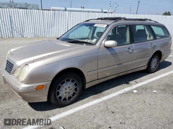 2000 Mercedes-Benz E-Class AWD with VIN WDBJH82J8YX042547, listed as a Copart auction lot 58063494 with 138,392 mi miles and Salvage Title. Bid and sale history available at carsss.com. Image 1.