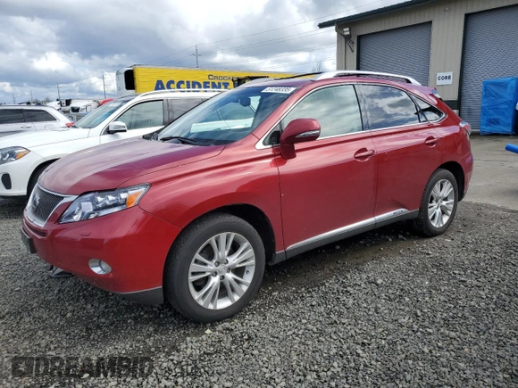 2010 Lexus RX 450h with VIN JTJBC1BAXA2403465, listed as a Copart auction lot 51248335 with 128,932 mi miles and Salvage Title. Bid and sale history available at DreamBid. Image 1.