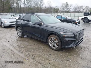 2022 Genesis GV70 Sport z VIN KMUMCDTC0NU018758, wystawiony jako IAAI lot #41735229 z przebiegiem 42 717 mil mil oraz . Historia ofert i sprzedaży dostępna na DreamBid. Obrazek 1.