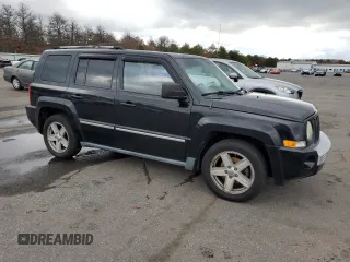 2010 Jeep Patriot Limited with VIN 1J4NF4GB0AD511652, listed as a Copart auction lot 82161234 with 173,164 mi miles and Clean Title. Bid and sale history available at carsss.com. Image 4.