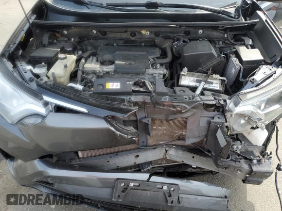 2018 Toyota RAV4 XLE with VIN JTMRFREV5JJ739973, listed as a Copart auction lot 54490225 with 65,807 mi miles and Salvage Title. Bid and sale history available at DreamBid. Image 12.