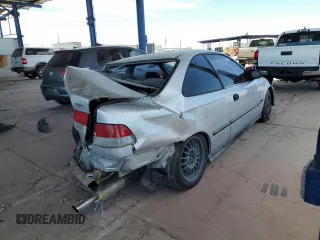 1999 Honda Civic DX with VIN 1HGEJ6125XL086017, listed as a Copart auction lot 58728564 with 262,100 mi miles and Salvage Title. Bid and sale history available at carsss.com. Image 3.