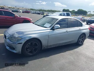 2015 BMW 3 Series 320i with VIN WBA3B1G53FNT05936, listed as a IAAI auction lot 42591667 with 143,594 mi miles and . Bid and sale history available at DreamBid. Image 6.