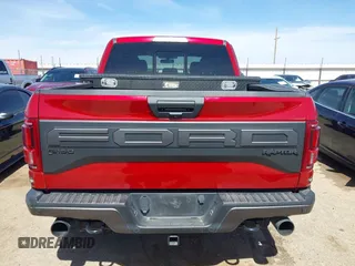 2020 Ford F-150 Raptor with VIN 1FTFW1RG9LFA36558, listed as a IAAI auction lot 41804510 with 64,328 mi miles and . Bid and sale history available at carsss.com. Image 16.