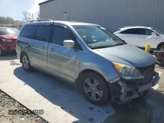 2010 Honda Odyssey Touring with VIN 5FNRL3H97AB096960, listed as a Copart auction lot 49291025 with 167,224 mi miles and Salvage Title. Bid and sale history available at carsss.com. Image 4.