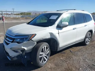 2017 Honda Pilot Elite with VIN 5FNYF6H02HB042160, listed as a IAAI auction lot 40893685 with Not Provided miles and . Bid and sale history available at DreamBid. Image 16.