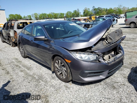 2018 Honda Civic EX with VIN 19XFC2F76JE027598, listed as a Copart auction lot 52301385 with 128,854 mi miles and Salvage Title. Bid and sale history available at DreamBid. Image 4.