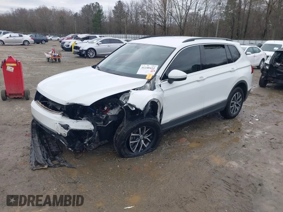 2020 Volkswagen Tiguan SE with VIN 3VV3B7AX2LM055418, listed as a IAAI auction lot 41248422 with Not Provided miles and . Bid and sale history available at DreamBid. Image 2.