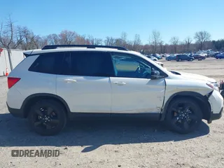 2019 Honda Passport Elite z VIN 5FNYF8H04KB005307, wystawiony jako IAAI lot #41828725 z przebiegiem 61 864 mil mil oraz . Historia ofert i sprzedaży dostępna na DreamBid. Obrazek 13.