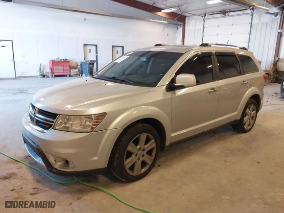 2014 Dodge Journey Limited with VIN 3C4PDDDG4ET175007, listed as a IAAI auction lot 41888742 with 218,585 mi miles. Bid and sale history available at carsss.com. Image 2.