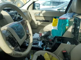 2010 Ford Escape Limited with VIN 1FMCU9E77AKD23121, listed as a Copart auction lot 50243295 with Not provided miles and Salvage title. Bid and sale history available at DreamBid. Image 8.