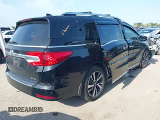 2019 Honda Odyssey Elite with VIN 5FNRL6H92KB089949, listed as a IAAI auction lot 42217646 with 61,193 mi miles and . Bid and sale history available at DreamBid. Image 4.