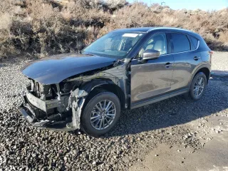 2017 Mazda CX-5 Touring with VIN JM3KFBCL2H0204097, listed as a Copart auction lot 88173195 with 76,884 mi miles and Salvage Title. Bid and sale history available at carsss.com. Image 1.