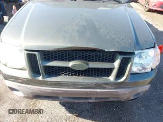 2001 Ford Explorer Sport Trac z VIN 1FMZU67E61UC97894, wystawiony jako IAAI lot #42636012 z przebiegiem 167 633 mil mil oraz . Historia ofert i sprzedaży dostępna na DreamBid. Obrazek 6.
