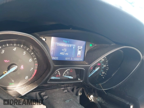 2013 Ford Focus SE z VIN 1FADP3F20DL361861, wystawiony jako IAAI lot #42652227 z przebiegiem 104 502 mil mil oraz . Historia ofert i sprzedaży dostępna na DreamBid. Obrazek 7.