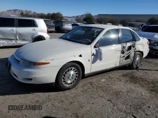 2001 Saturn LS z VIN 1G8JU52F61Y544300, wystawiony jako Copart lot #42167315 z przebiegiem 153 896 mil mil oraz Szkody całkowita. Historia ofert i sprzedaży dostępna na DreamBid. Obrazek 1.