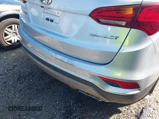 2018 Hyundai Santa Fe 2.0T z VIN 5XYZU4LA1JG516466, wystawiony jako IAAI lot #42265607 z przebiegiem 110 655 mil mil oraz . Historia ofert i sprzedaży dostępna na DreamBid. Obrazek 17.