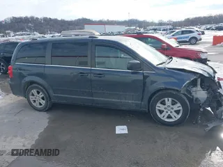 2013 Dodge Grand Caravan Crew with VIN 2C4RDGDG9DR740086, listed as a IAAI auction lot 41362852 with 145,881 mi miles and . Bid and sale history available at DreamBid. Image 12.