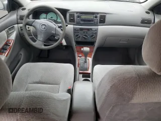 2004 Toyota Corolla CE with VIN 1NXBR32E34Z297414, listed as a Copart auction lot 52541105 with 147,072 mi miles and Salvage Title. Bid and sale history available at DreamBid. Image 8.