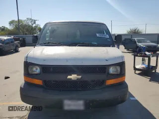 2014 Chevrolet Express Cargo Van with VIN 1GCWGGBA8E1197909, listed as a Copart auction lot 74050564 with 0 mi miles and Salvage Title. Bid and sale history available at carsss.com. Image 5.
