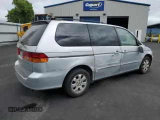 2002 Honda Odyssey EX-L with VIN 2HKRL18902H506828, listed as a Copart auction lot 53735625 with 214,446 mi miles and Salvage title. Bid and sale history available at DreamBid. Image 3.