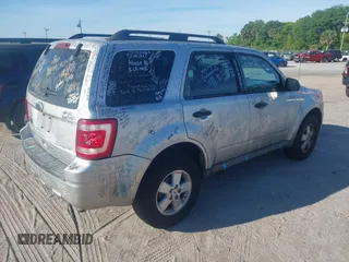 2010 Ford Escape XLT with VIN 1FMCU0D7XAKD16869, listed as a IAAI auction lot 41884141 with 145,781 mi miles. Bid and sale history available at carsss.com. Image 4.