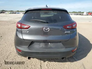 2017 Mazda CX-3 Touring z VIN JM1DKDC77H0151148, wystawiony jako Copart lot #81897434 z przebiegiem Nie podano mil oraz Szkoda całkowita • Salvage title. Historia ofert i sprzedaży dostępna na DreamBid. Obrazek 6.