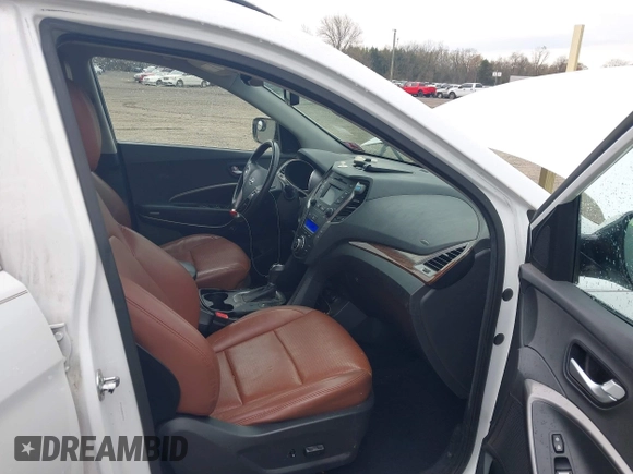 2013 Hyundai Santa Fe Sport z VIN 5XYZUDLA8DG079795, wystawiony jako IAAI lot #42035743 z przebiegiem 170 321 mil mil oraz . Historia ofert i sprzedaży dostępna na DreamBid. Obrazek 5.