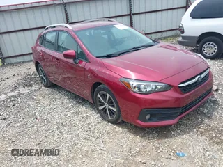 2021 Subaru Impreza Premium z VIN 4S3GTAV65M3715725, wystawiony jako IAAI lot #42473360 z przebiegiem 67 168 mil mil oraz . Historia ofert i sprzedaży dostępna na DreamBid. Obrazek 1.