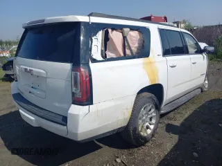 2019 GMC Yukon XL SLT with VIN 1GKS2GKC1KR279755, listed as a Copart auction lot 64695394 with 0 mi miles and Salvage Title. Bid and sale history available at carsss.com. Image 3.
