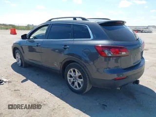 2015 Mazda CX-9 Sport with VIN JM3TB2BA7F0465965, listed as a IAAI auction lot 40348982 with 165,284 mi miles and . Bid and sale history available at carsss.com. Image 3.