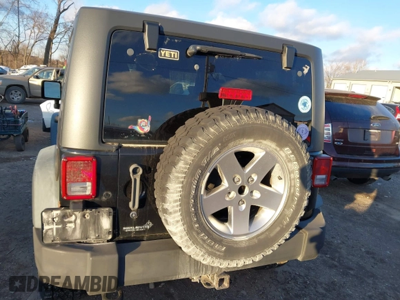 2011 Jeep Wrangler Rubicon with VIN 1J4HA6D11BL564211, listed as a IAAI auction lot 41242240 with 124,039 mi miles and . Bid and sale history available at carsss.com. Image 16.