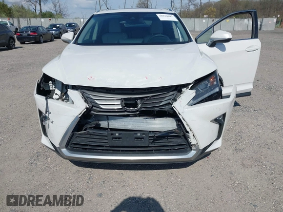 2018 Lexus RX 350 with VIN 2T2BZMCA2JC164234, listed as a IAAI auction lot 42030641 with 74,160 mi miles and . Bid and sale history available at DreamBid. Image 6.