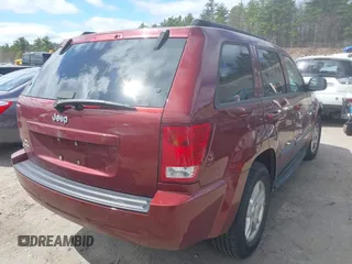 2007 Jeep Grand Cherokee Laredo with VIN 1J8GR48K27C518078, listed as a IAAI auction lot 42028460 with 121,530 mi miles. Bid and sale history available at carsss.com. Image 4.