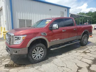 2017 Nissan Titan Pro-4X z VIN 1N6BA1F43HN562363, wystawiony jako Copart lot #58604115 z przebiegiem 102 412 mil mil oraz Tytuł czysty. Historia ofert i sprzedaży dostępna na DreamBid. Obrazek 1.