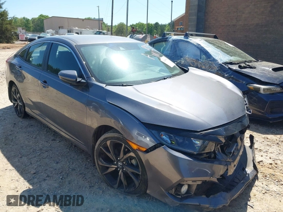 2019 Honda Civic Sport with VIN 19XFC2F88KE028035, listed as a IAAI auction lot 42000936 with 51,666 mi miles and . Bid and sale history available at DreamBid. Image 1.