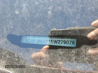 2014 Jeep Cherokee Sport with VIN 1C4PJMAB1EW279076, listed as a Copart auction lot 47952915 with 176,083 mi miles and Salvage Title. Bid and sale history available at carsss.com. Image 16.
