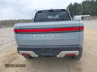 2023 Rivian R1T Adventure z VIN 7FCTGBAA6PN028520, wystawiony jako IAAI lot #42117498 z przebiegiem 24 583 mil mil oraz . Historia ofert i sprzedaży dostępna na DreamBid. Obrazek 17.
