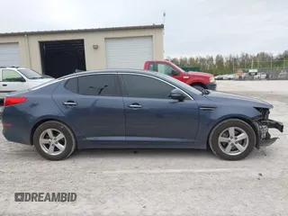 2015 Kia Optima LX z VIN 5XXGM4A79FG441283, wystawiony jako IAAI lot #40834778 z przebiegiem 210 110 mil mil oraz . Historia ofert i sprzedaży dostępna na DreamBid. Obrazek 14.